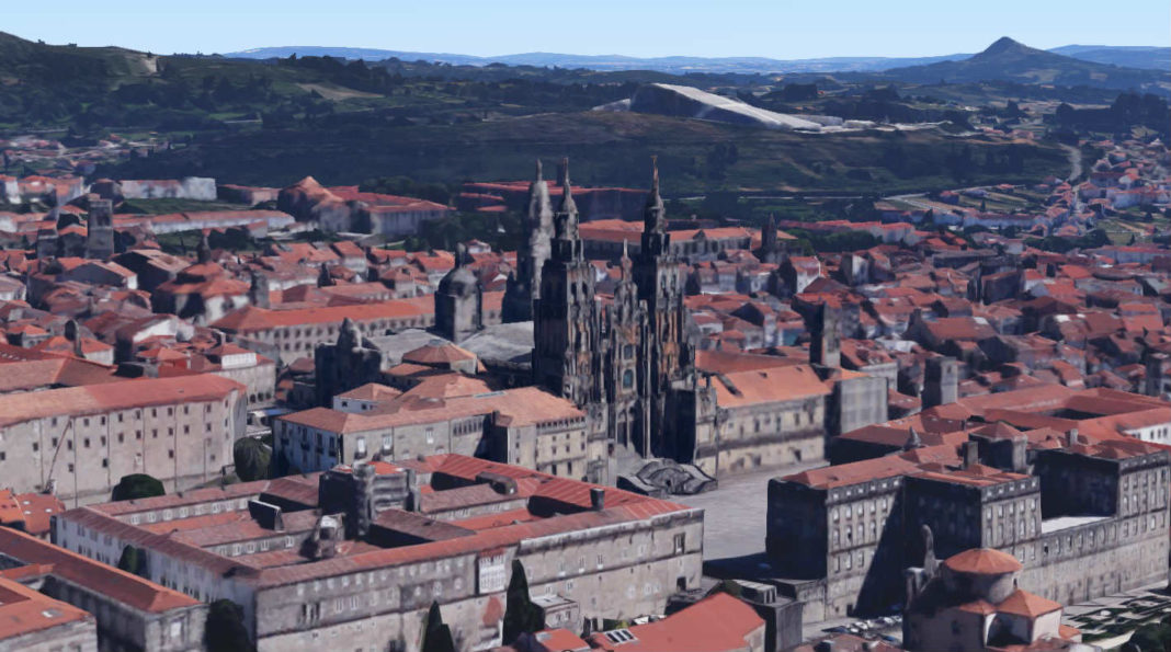 Vista de Compostela, coa catedral en primeiro plano, a Cidade da Cultura detrás e o Pico Sacro no fondo á dereita. 