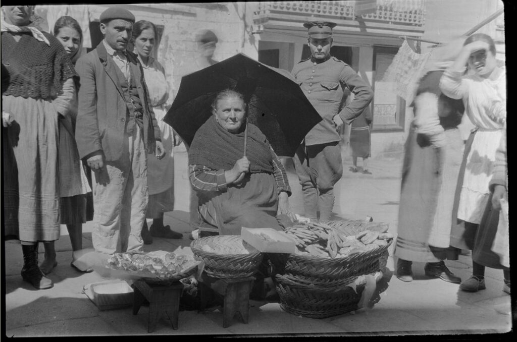 Vendedor de pasteis no mercado preto da colexiata. Imaxe: Ruth Matilda Anderson, a través da Hispanic Society of America
