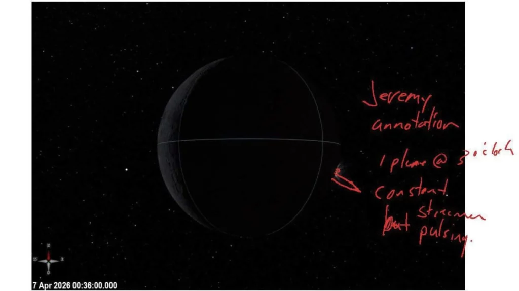 Captura de pantalla da tableta do astronauta de Artemis II Jeremy Hansen. Notas escritas a man engadidas sobre unha visualización dunha Lúa case ás escuras que eclipsa ao Sol. Foto: NASA